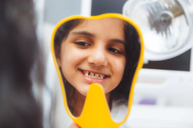 Boy looking in the mirror